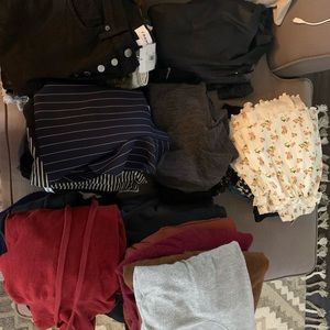 Box of high end, designer clothing